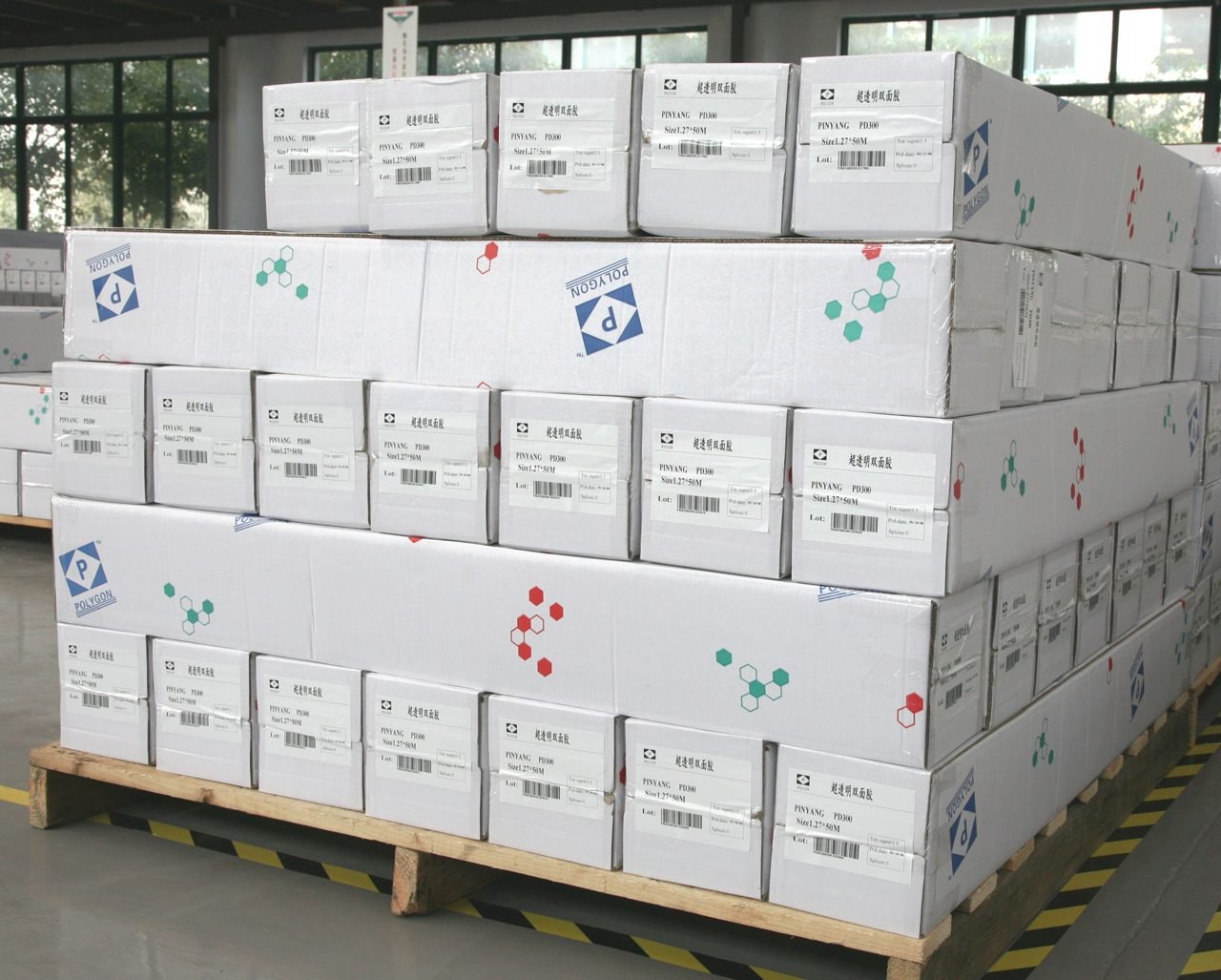 Finished goods boxed and stacked on pallets in the warehouse